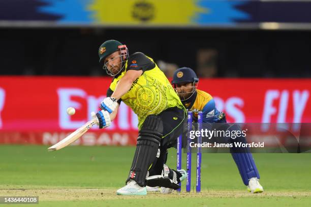 Aaron Finch of Australia plays his shot during the ICC Men's T20 World Cup match between Australia and Sri Lanka at Perth Stadium on October 25, 2022...