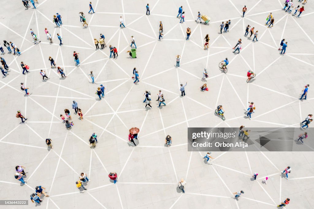 Aerial view of crowd connected by lines