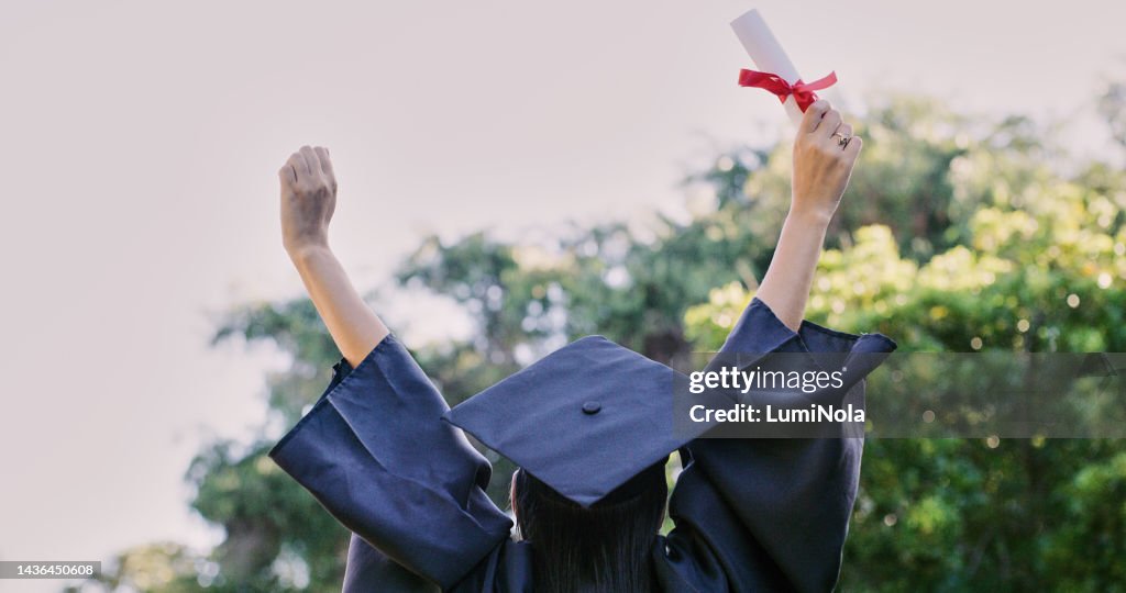 Graduation, education and success with a woman student holding a diploma or certificate in celebration outdoor. University, graduate and study with a female pupil cheering a college achievement