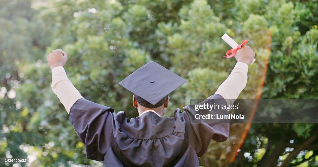 Graduate, success and education, celebrate graduation with certificate and pride for achievement. Winner, fist and academic event, degree with college diploma and happiness outdoors in cap and gown.