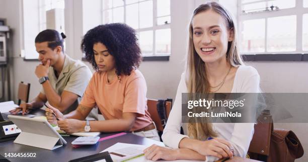 education, studying and accounting students in a classroom with a calculator for finance and learning budgeting. financial, school and university girl studying, working and bookkeeping in college - economics lesson stock pictures, royalty-free photos & images