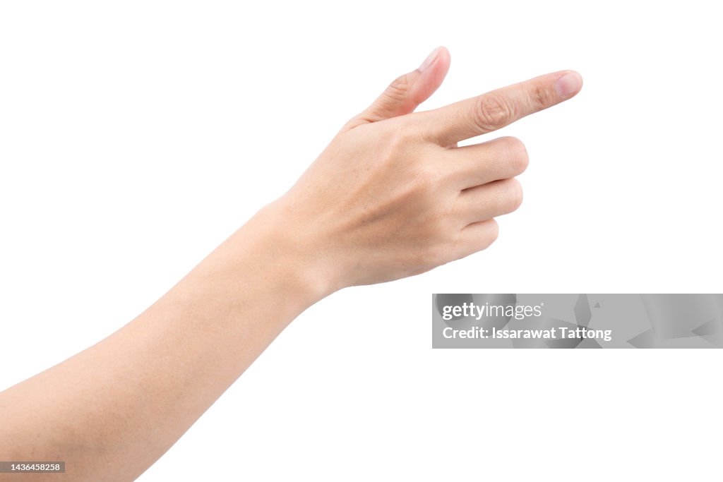 Female's hand touching or pointing to something isolated on white background. Close up. High resolution.