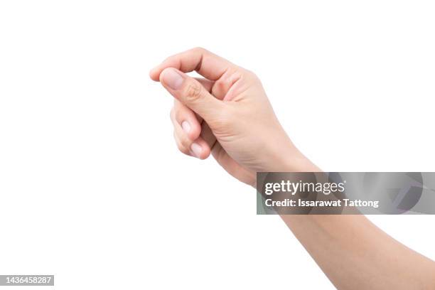 female hand holding a virtual card with your fingers on a white background - gesto con la mano foto e immagini stock