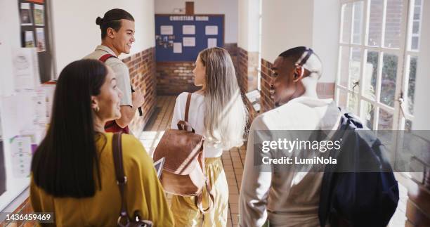 walking, school and friends talking at university in the hallway about education, scholarship and project. group of students in communication on campus while on a walk to class together at college - scholarship award stock pictures, royalty-free photos & images