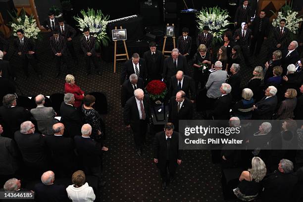 Pallbearers Sir Brian Lochore, Sir Colin Meads, Bob Graham, Waka Nathan, Alex Carpenter and Ian Kirkpatrick carry the casket following the funeral...