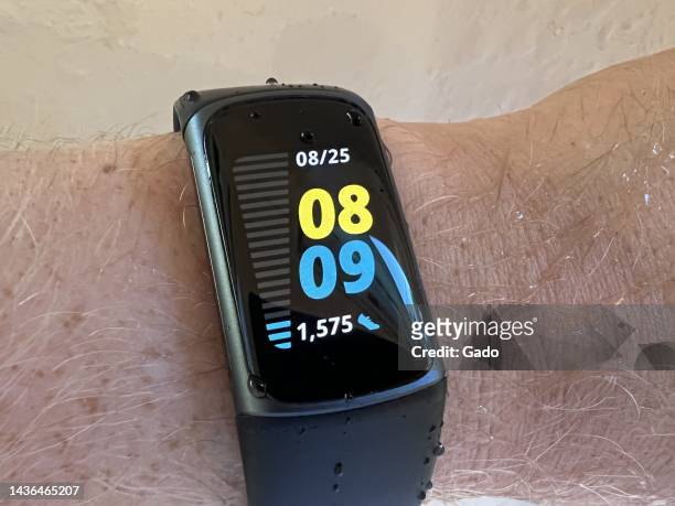 Fitbit Charge 5 fitness tracker wearable on a person's arm, Lafayette, California, August 25, 2022. Photo courtesy Sftm.