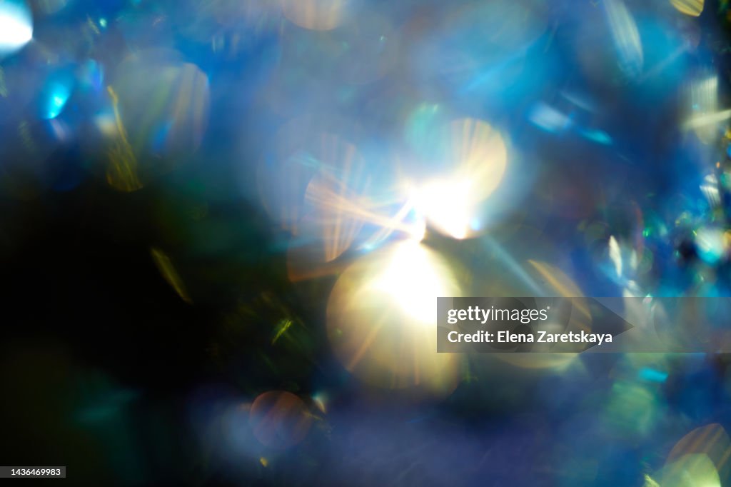 Abstract background of multicolored sequins bokeh