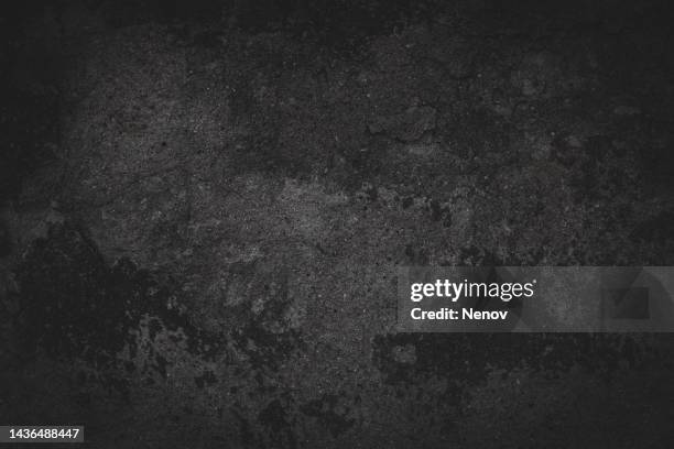 dark vignette image of a cement wall - textuur stockfoto's en -beelden