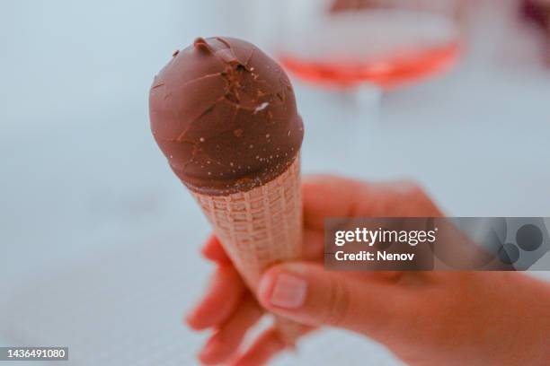 vanilla ice cream with chocolate glaze - glace cornet stock pictures, royalty-free photos & images