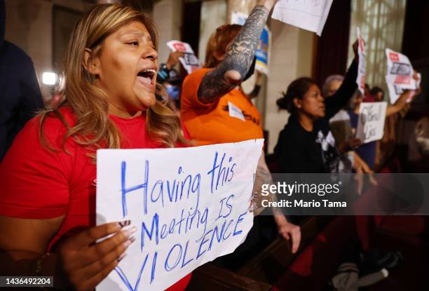 Protestors demonstrate as the L.A. City Council holds its first in-person meeting since voting in new president Paul Krekorian in the wake of a...