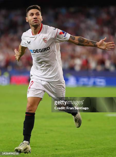 Gonzalo Montiel of Sevilla FC celebrates after scoring their team's third goal during the UEFA Champions League group G match between Sevilla FC and...