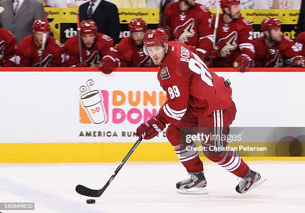 Mikkel Boedker of the Phoenix Coyotes skates with the puck in Game One of the Western Conference Semifinals against the Nashville Predators during...