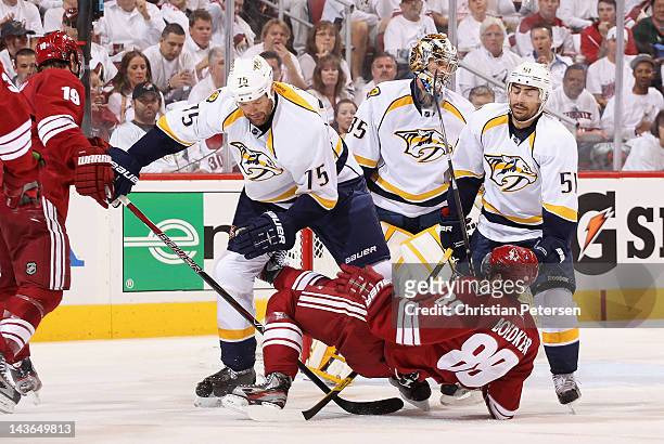 Hal Gill of the Nashville Predators knocks over Mikkel Boedker of the Phoenix Coyotes in Game One of the Western Conference Semifinals during the...