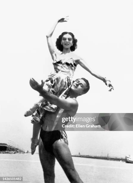 British ballet dancers and choreographers Anton Dolin and Alicia Markova pose on Lido Beach, Venice, Italy, 1959.