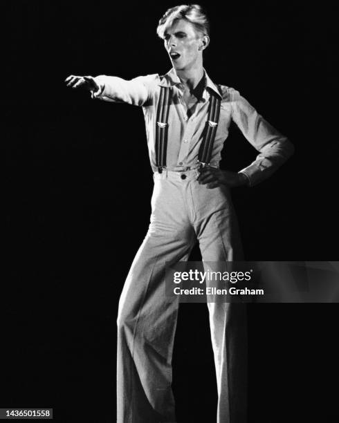 English Rock & Pop musician and actor David Bowie performs on stage, Los Angeles, California, 1975.