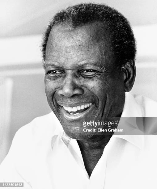 View of Bahamian-American actor & Civil Rights activist Sidney Poitier as he laughs, at the Hotel du Cap, Antibes, France, 2001.