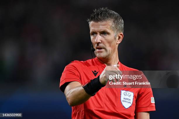 Referee Daniele Orsato looks on during the UEFA Champions League group F match between RB Leipzig and Real Madrid at Red Bull Arena on October 25,...