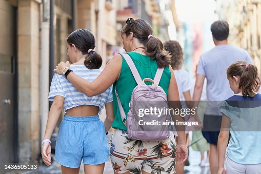 Backpack On Backwards Women Walking Backwards With Backpacks One Wearing Sunglasses On Her ...