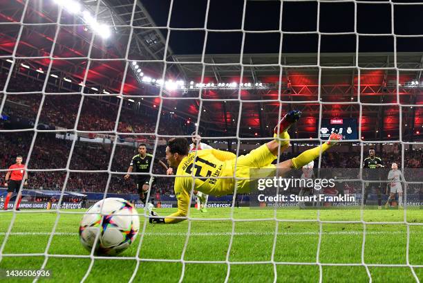 General view as Vinicius Junior of Real Madrid scores their side's first goal as Janis Blaswich of RB Leipzig attempts to make a save during the UEFA...