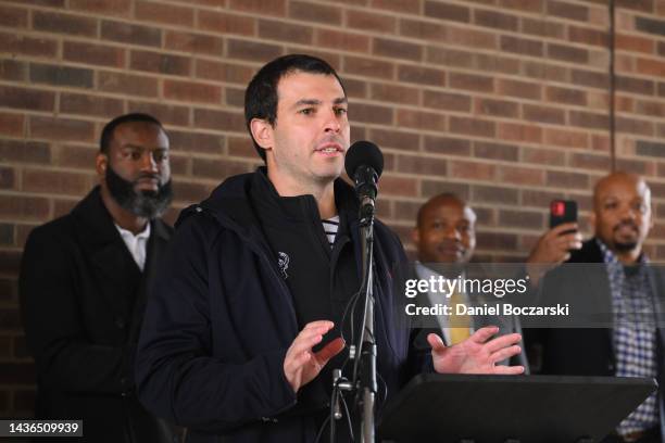 Senior Vice President of the Milwaukee Bucks Alex Lasry speaks to attendees at a stop during a march to get out the vote on the first day of early...