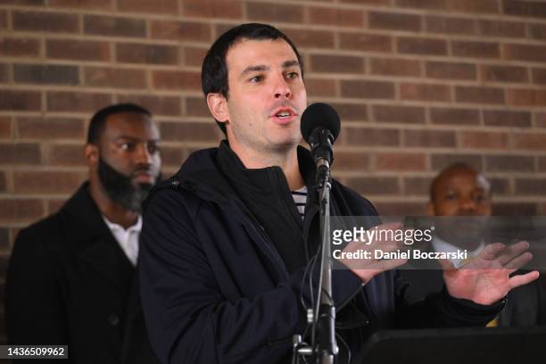Senior Vice President of the Milwaukee Bucks Alex Lasry speaks to attendees at a stop during a march to get out the vote on the first day of early...
