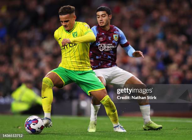 Maximillian Aarons of Norwich City is challenged by Anass Zaroury of Burnley during the Sky Bet Championship between Burnley and Norwich City at Turf...