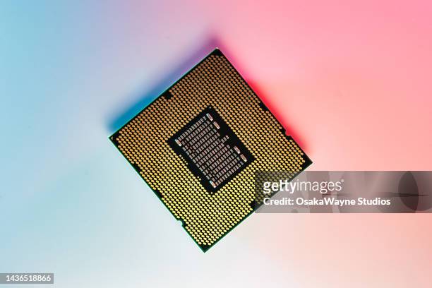 computer processor cpu with colored light. - semiconductor stock-fotos und bilder