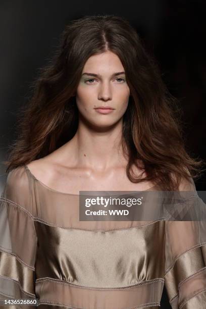 Model on the runway at Alberta Ferretti's spring 2011 show.