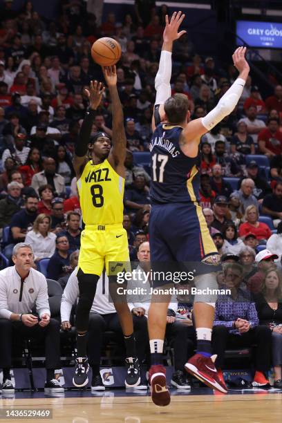 Jarred Vanderbilt of the Utah Jazz shoots over Jonas Valanciunas of the New Orleans Pelicans during a game at the Smoothie King Center on October 23,...