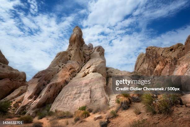 low angle view of rock formations against sky,clark county,nevada,united states,usa - nevada landscape stock pictures, royalty-free photos & images