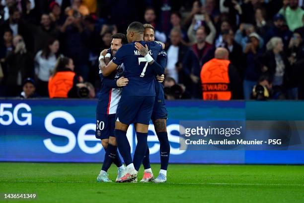 Neymar Jr of Paris Saint-Germain is congratulated by teammates Leo Messi and Kylian Mbappe after scoring during the UEFA Champions League group H...