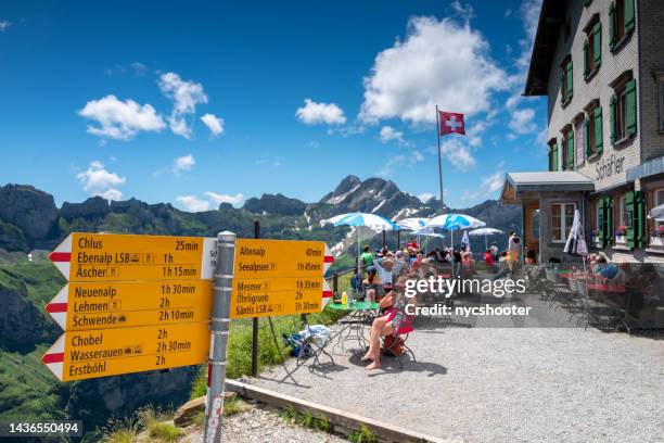 trail signpost directing hikers in the alpstein area of the swiss alps near the berggasthaus schaefler - appenzell innerrhoden stock pictures, royalty-free photos & images