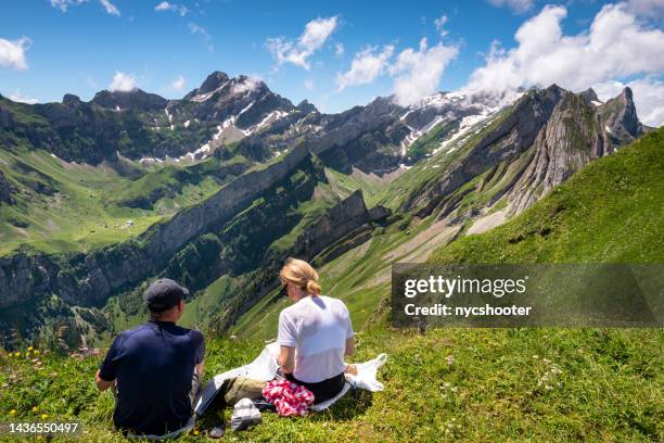 hikers enjoying the swiss alps in appenzell region of the alps - appenzell innerrhoden stock pictures, royalty-free photos & images