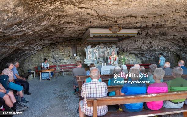 wildkirchi cave church in the appenzeller alps, switzerland - appenzell innerrhoden stock pictures, royalty-free photos & images