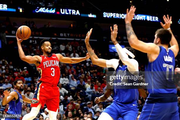 McCollum of the New Orleans Pelicans looks to pass the ball during the second quarter against the Dallas Mavericks at Smoothie King Center on October...