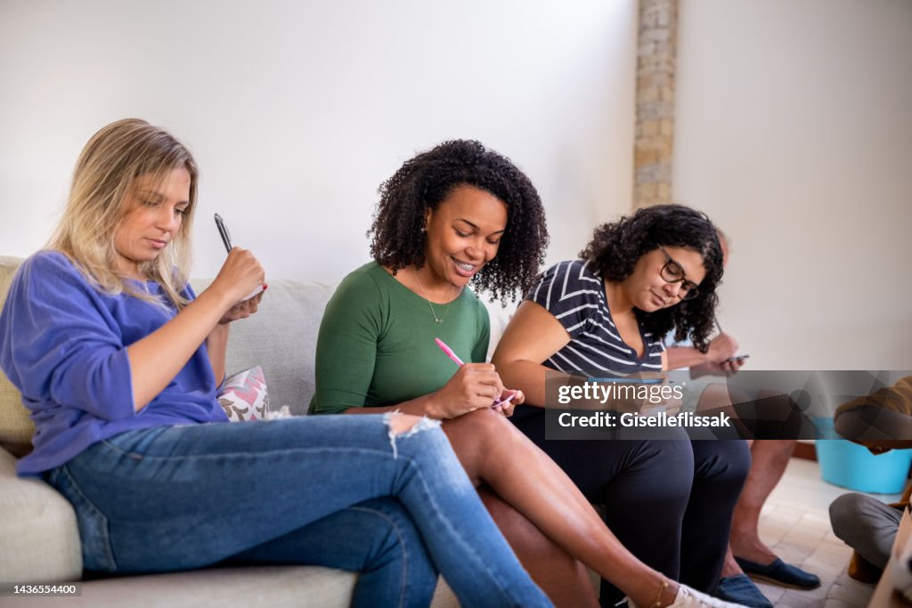 Friends playing leisure games at home