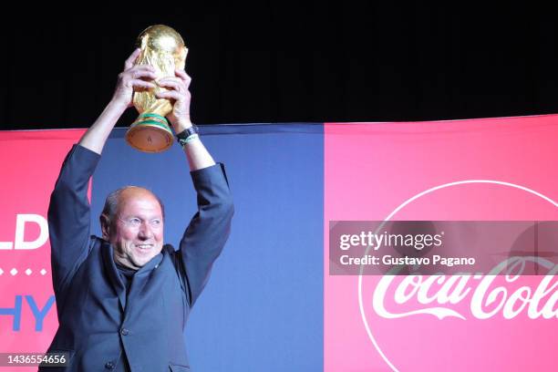 Omar Larrosa former Argentinian player poses with the FIFA Men's World Cup Trophy during the FIFA World Cup Trophy Tour at Julio H. Grondona Training...