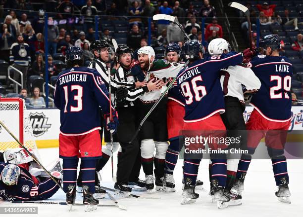 Zack Kassian of the Arizona Coyotes reacts as the Coyotes and Columbus Blue Jackets fight over interference with Blue Jackets goaltender Elvis...