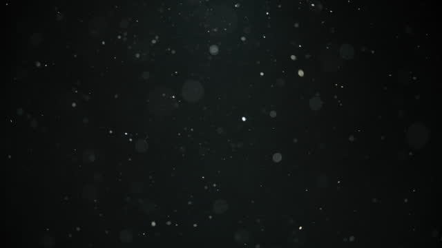 Particles on black background