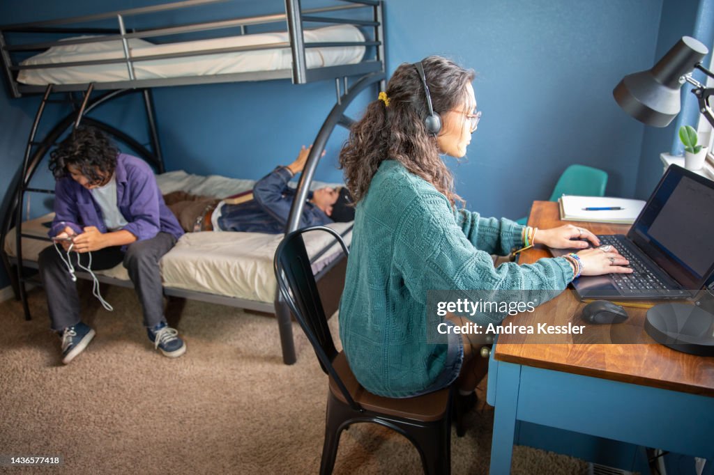Student Rool College Students In A Dorm Room Studying And Hanging Out High-Res Stock ...