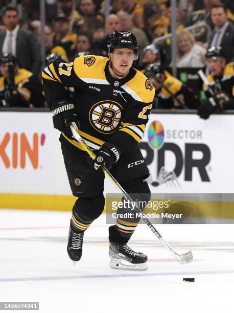 Hampus Lindholm of the Boston Bruins skates against the Dallas Stars during the first period at TD Garden on October 25, 2022 in Boston,...