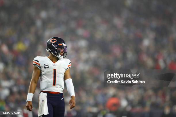 Justin Fields of the Chicago Bears reacts after a play during an NFL football game against the New England Patriots at Gillette Stadium on October...