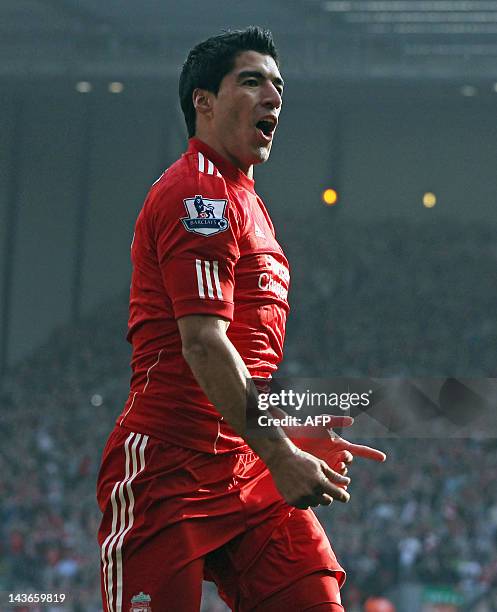 Liverpool's Uruguayan striker Luis Suarez celebrates scoring his soon to be disallowed goal during the English Premier League football match between...