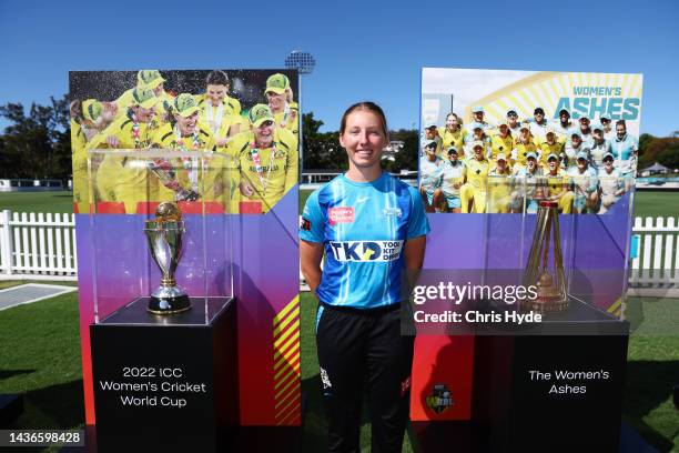 Darcie Brown of the Strikers pose with the ICC Women’s Cricket World Cup 2022 and The Women’s Ashes during a Cricket Australia Women's Trophy...