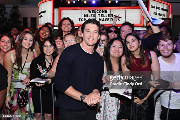 Miles Teller poses with fans during the 25th SCAD Savannah Film Festival - Day 4 on October 25, 2022 in Savannah, Georgia.