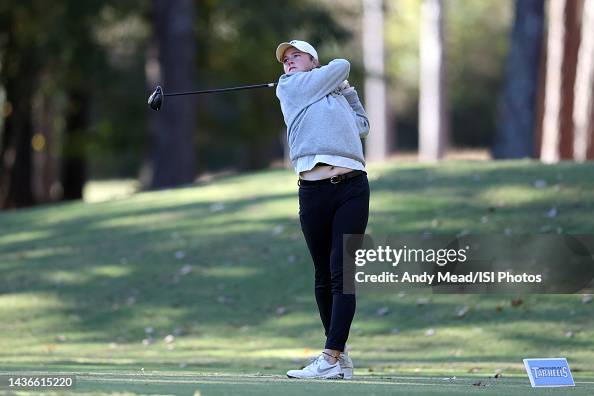 Mimi Rhodes of Wake Forest University hits a tee shot on the 7th hole ...