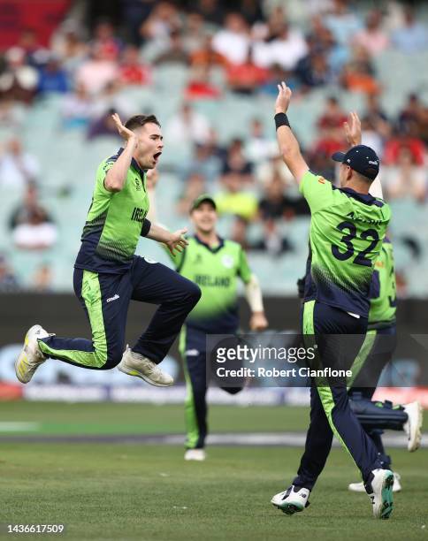 Josh Little of Ireland celebrates taking the wicket of Jos Buttler of England during the ICC Men's T20 World Cup match between England and Ireland at...