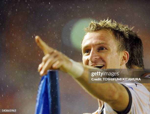 Brisbane Roar forward Besart Berisha celebrates his goal during their AFC Champions League Group F football match against FC Tokyo in Tokyo on May 2,...