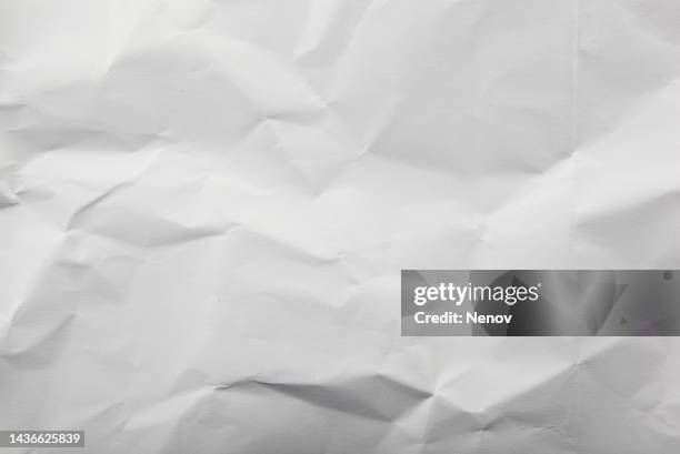 texture of crumpled white paper - crumpled paper stockfoto's en -beelden