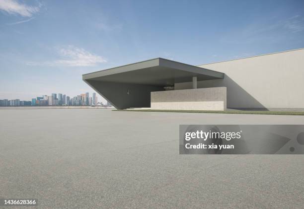 empty square front of modern architecture with city skyline - modern warehouse stock pictures, royalty-free photos & images